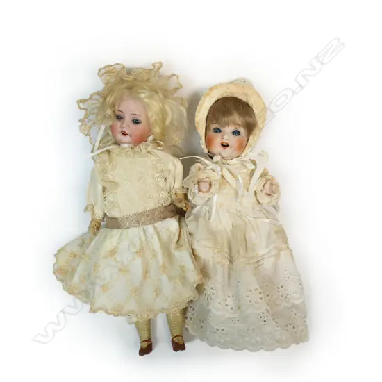 Two antique small sleepy girl dolls,