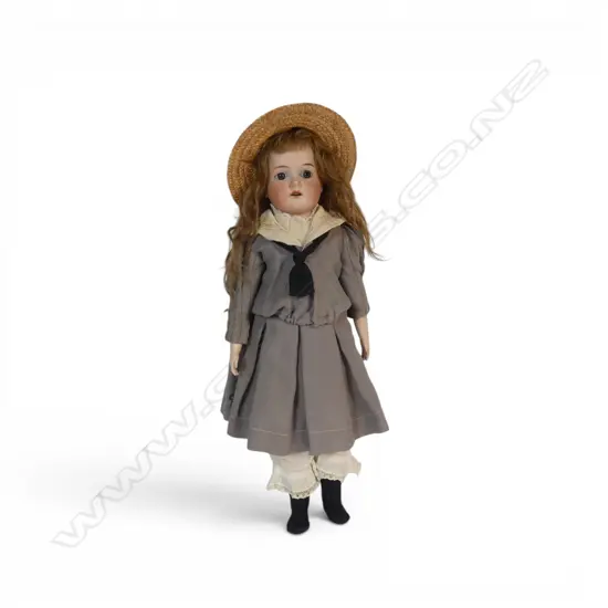 Vintage Armand Marseille doll with straw hat,