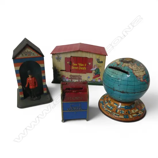 Four vintage novelty money boxes,