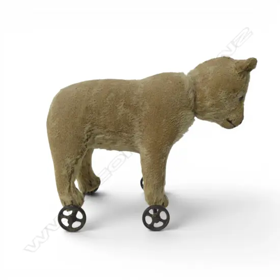 Vintage Steiff pull-along bear on wheels,
