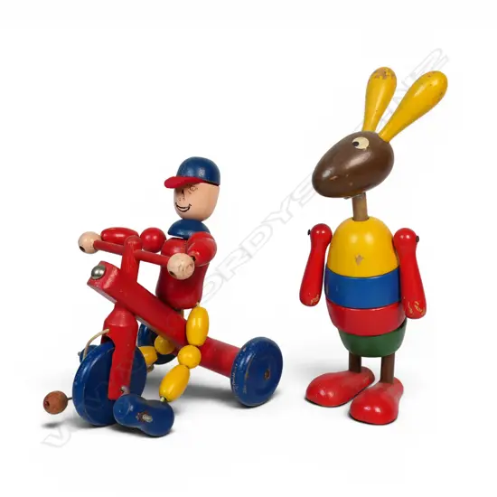 Two vintage wooden toys; a folk-art rabbit and 'Trikey Tom' pull-along toy,