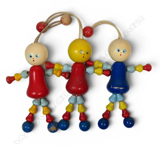 Three wooden Mary Lou dolls,