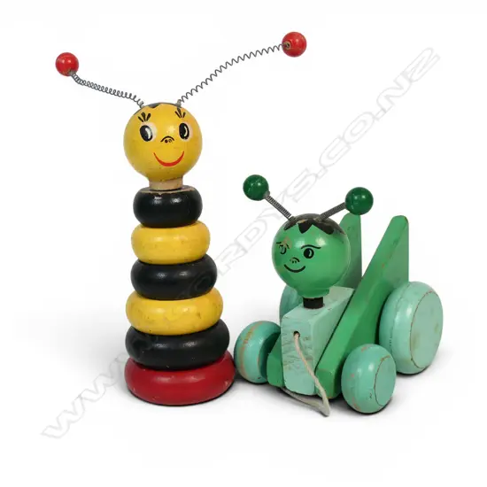 Two vintage wooden toys; stacking-toy bee and pull-along cricket,