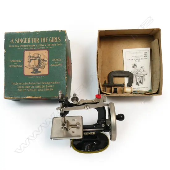 Early 20thC original boxed American child's sewing machine,