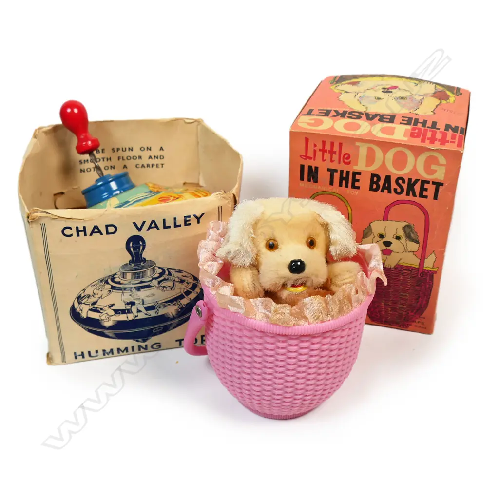 Two original boxed toys: 'Humming Top' by Chad Valley and 'Little Dog In The Basket', Image 1++