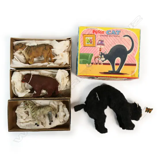Three early 20thC German flock covered animal toys and boxed 'Mechanical Pussy Cat Chasing Butterfly',