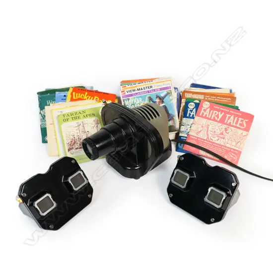 Three boxed 'View-Master' stereoscopic viewers,