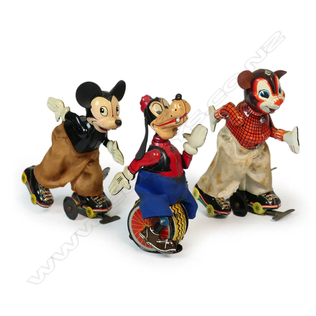 Three tinplate vintage mechanical Japanese Happy skater toys, Image 1++