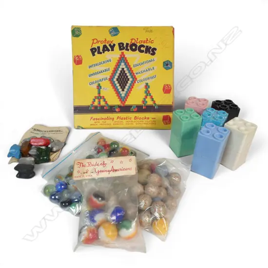 Three vintage packets of marbles,