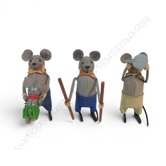 Three vintage Schuco clockwork mice,