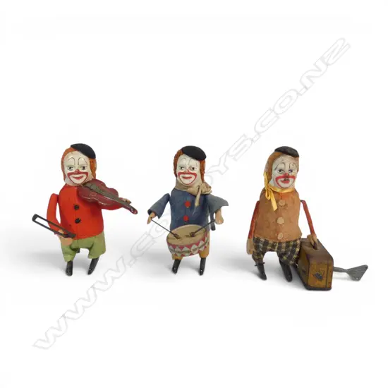 Three vintage Schuco clockwork clown toys,