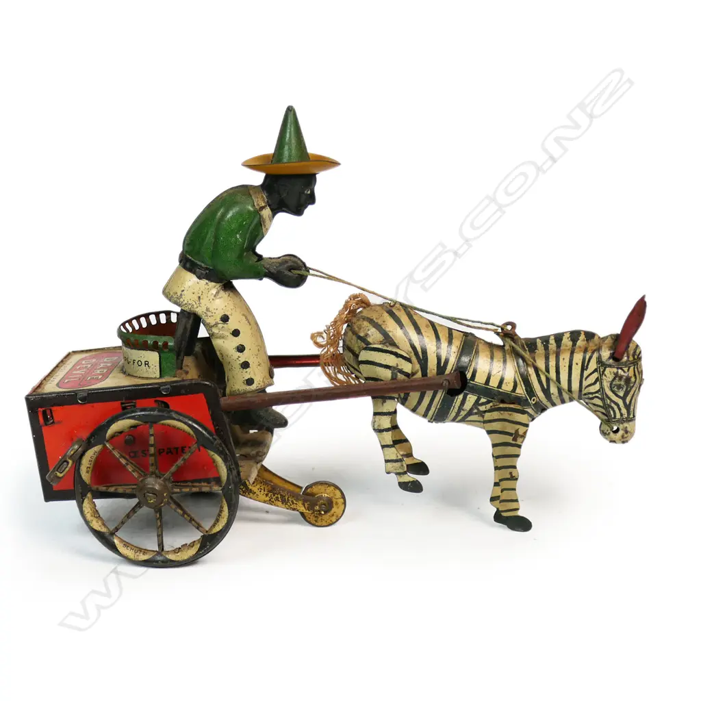 A Lehmann tinplate clockwork Dare Devil toy of a zebra pulling a man on a cart Image 1++