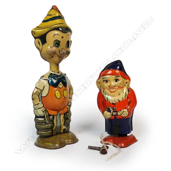 A Marx Pinocchio wind-up walker toy with a boxed 'Giddy' the walking gnome mechanical figure