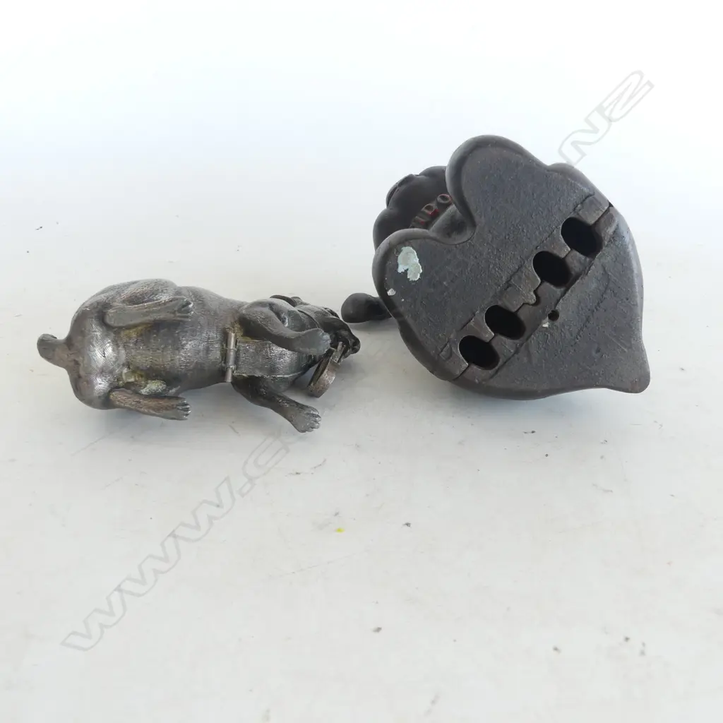 Two vintage animal shaped cast iron money banks, Image 1++