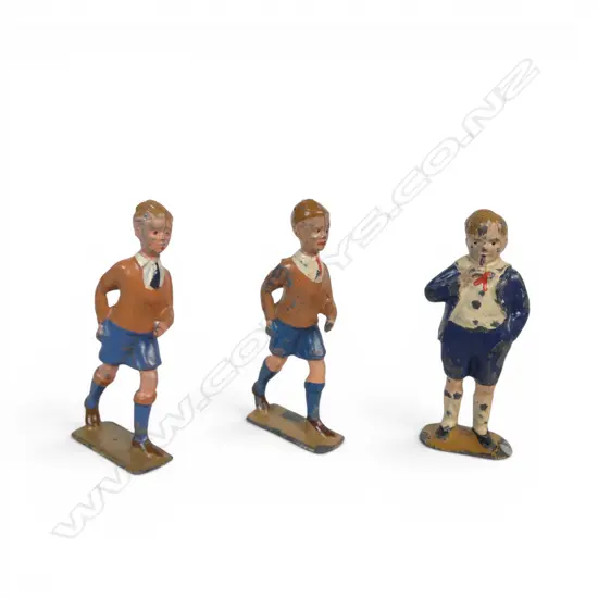 Three Cadbury Ltd. 1930's hollow cast lead Cococub figures of Jonathan - the leader of the Cococubs animals,