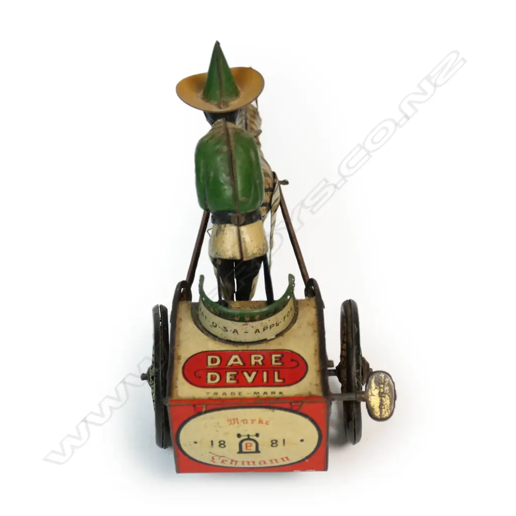 A Lehmann tinplate clockwork Dare Devil toy of a zebra pulling a man on a cart Image 1++