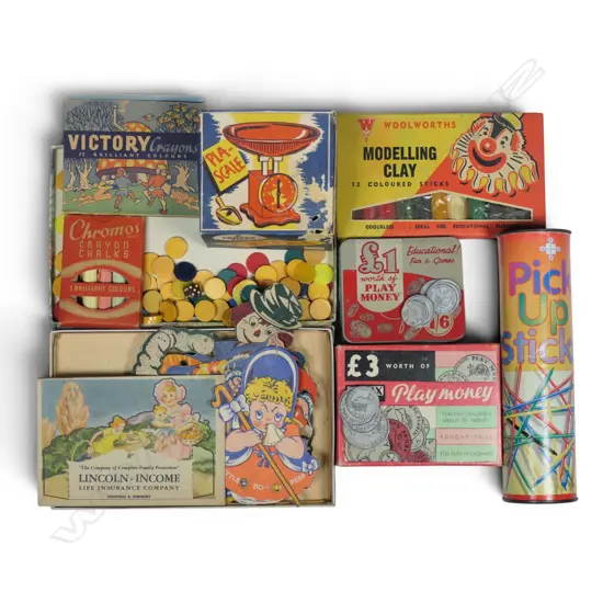 A collection of assorted vintage small toys,
