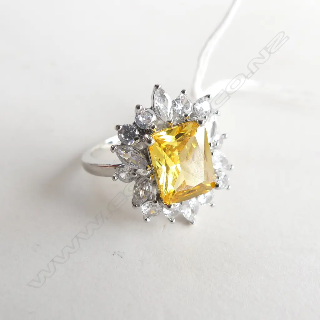 FAUX CITRINE AND WHITE STONE  RING IN SILVER PLATE Image 1++