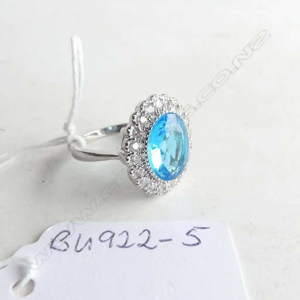 FAUX BLUE ZIRCON AND FAUX DIAMOND RING IN SILVER PLATE Image 1++