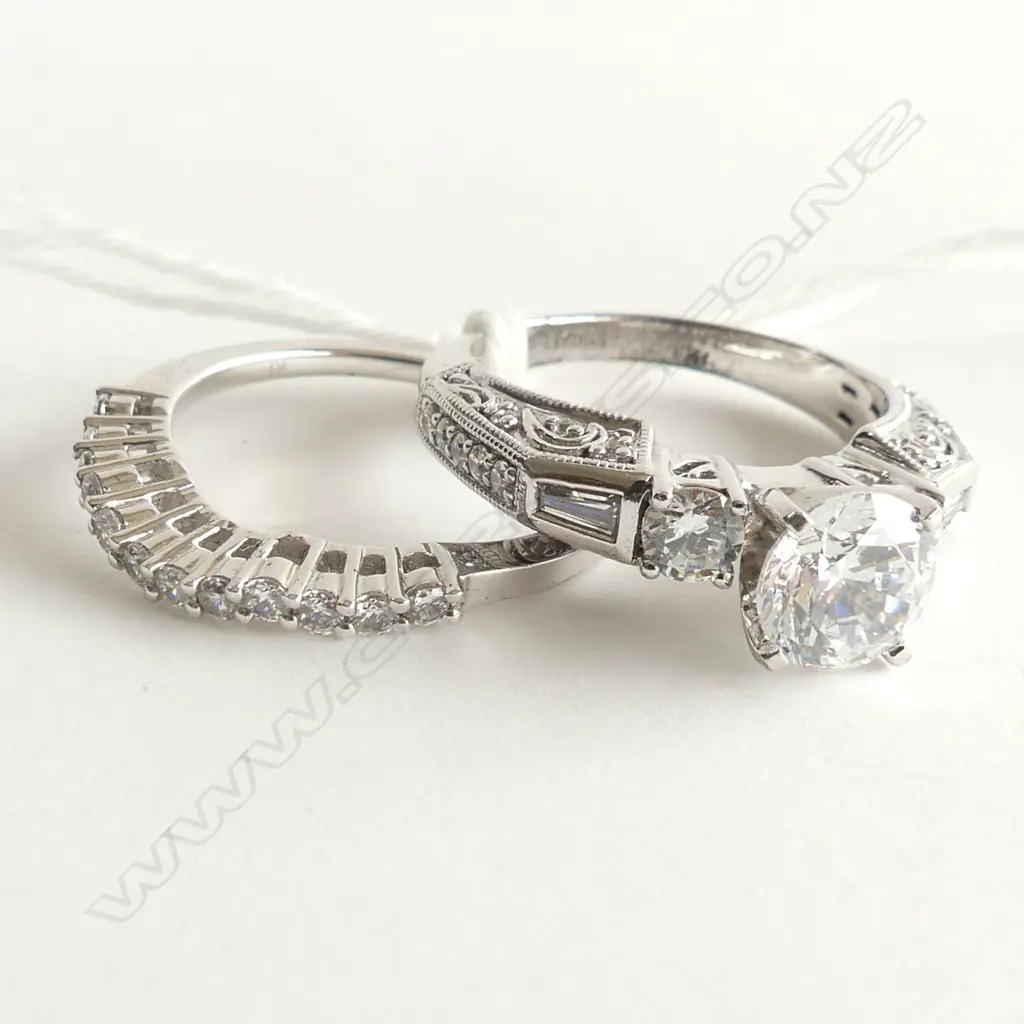 2 CZ & 925 SILVER RINGS; 1 SEMI CURVED CZ WEDDER + 3 MOUNTED CZ RING Image 1++