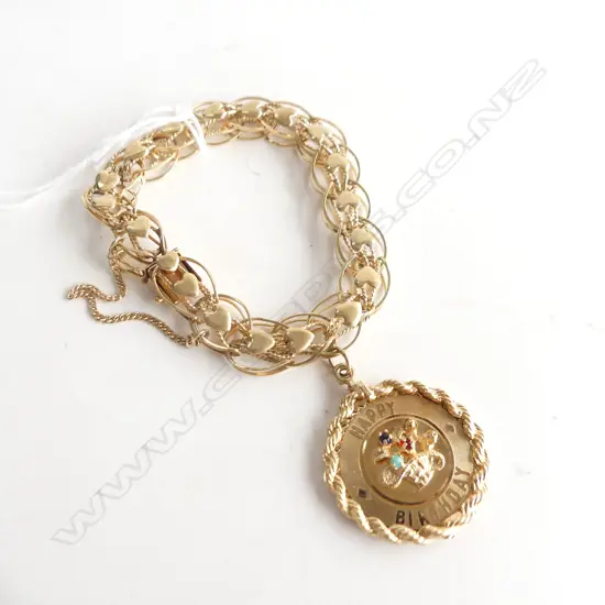 14k GOLD BRACELET WITH BIRTHDAY CHARM 20.76gms