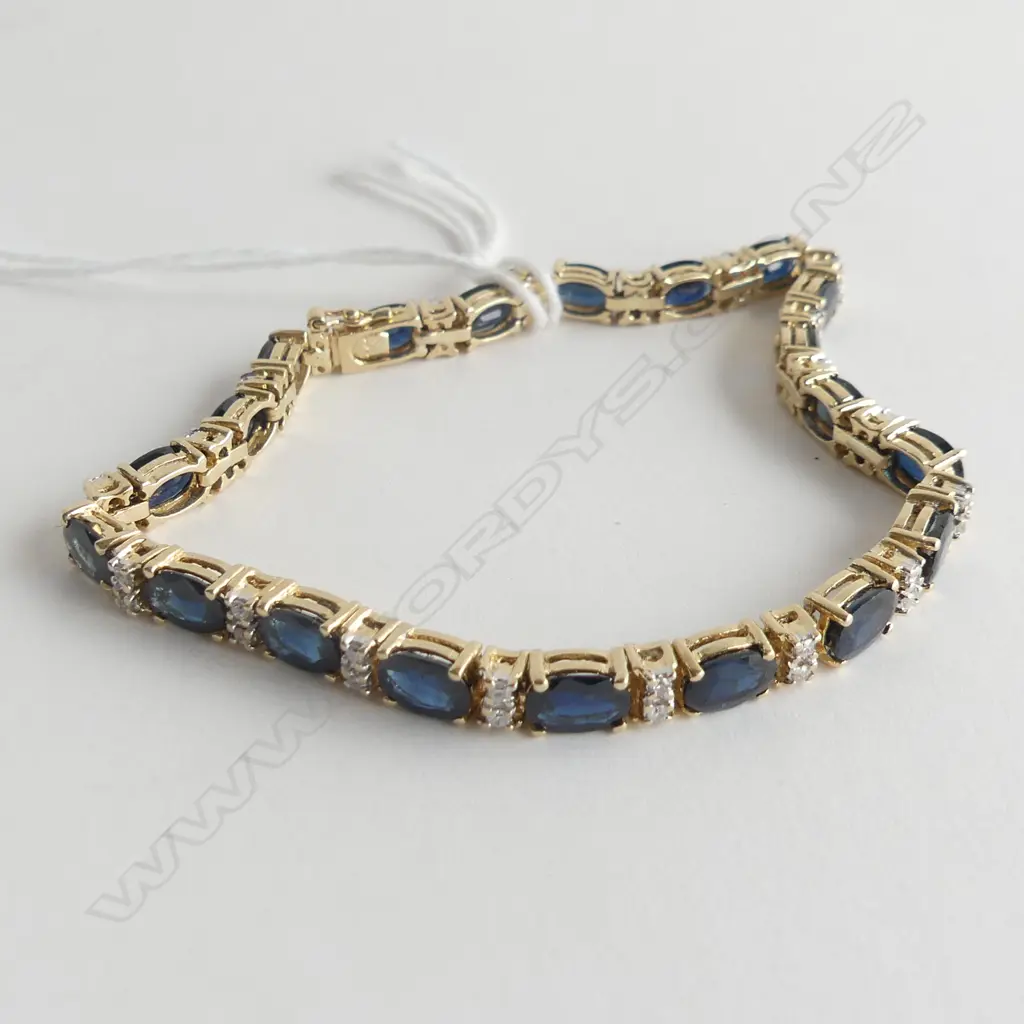 9CT GOLD SAPPHIRE AND DIAMOND TENNIS BRACELET 13.1gm Image 1++