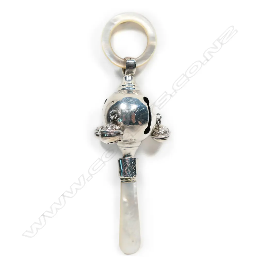 An early 1900s silver and mother of pearl baby rattle, Image 1++