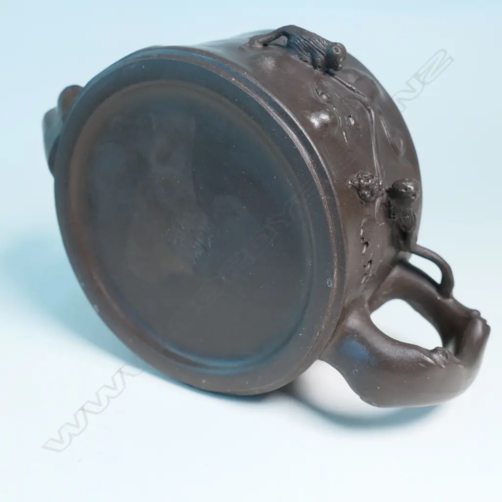 YIXING TEAPOT MARKED 蔣鳳英制 (JIANG FENGYING)  BASE 鳳英 (FENGYING) COVER. DARK BROWN, NATURALISTIC MODELLED. CHIPS. W.160mm Image 1++