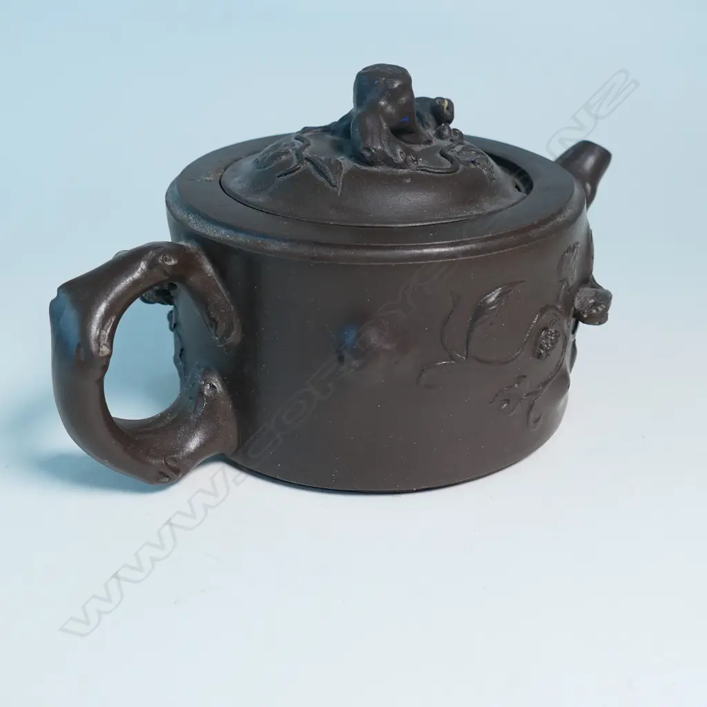 YIXING TEAPOT MARKED 蔣鳳英制 (JIANG FENGYING)  BASE 鳳英 (FENGYING) COVER. DARK BROWN, NATURALISTIC MODELLED. CHIPS. W.160mm Image 1++