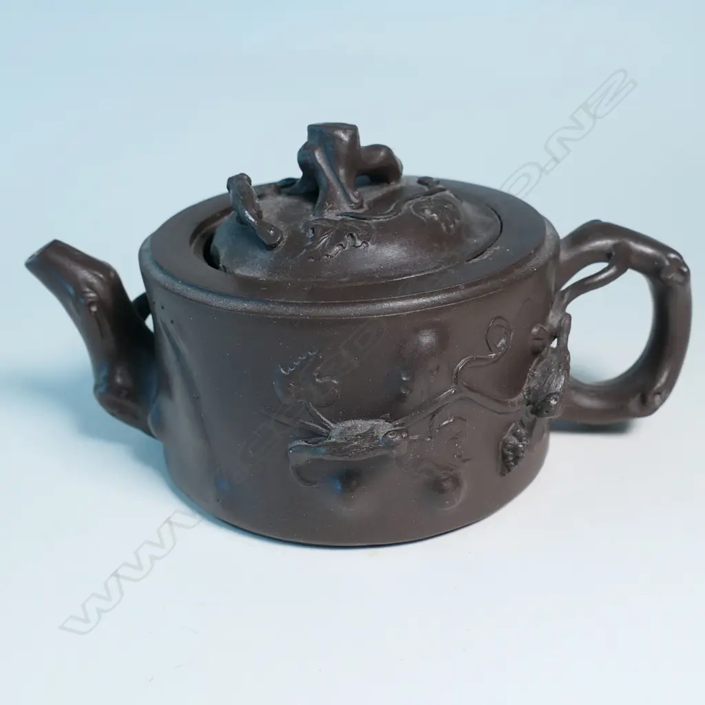YIXING TEAPOT MARKED 蔣鳳英制 (JIANG FENGYING)  BASE 鳳英 (FENGYING) COVER. DARK BROWN, NATURALISTIC MODELLED. CHIPS. W.160mm Image 1++