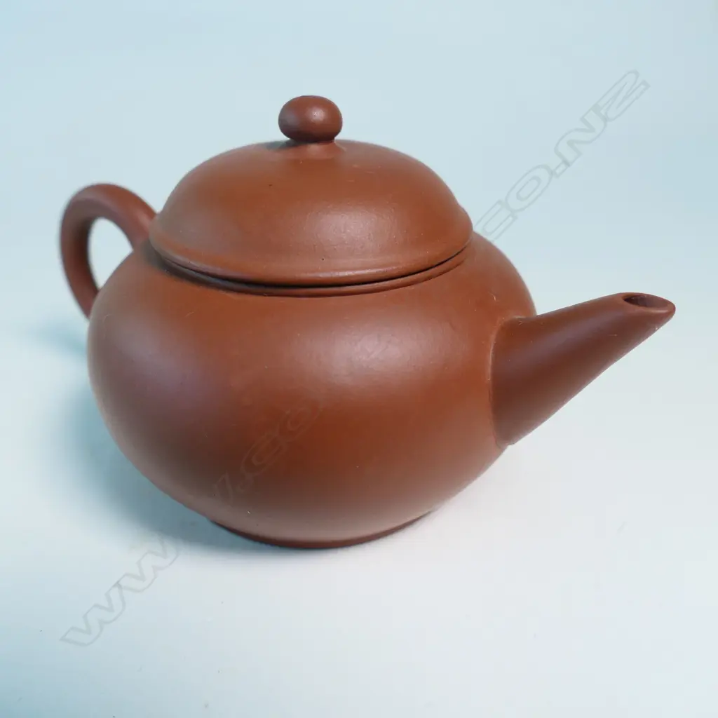 SMALL YIXING TEAPOT IN THE STYLE OF HUI MENGCHEN, MARKED 荊渓恵孟臣製, SQUAT CIRCULAR. W.130mm Image 1++