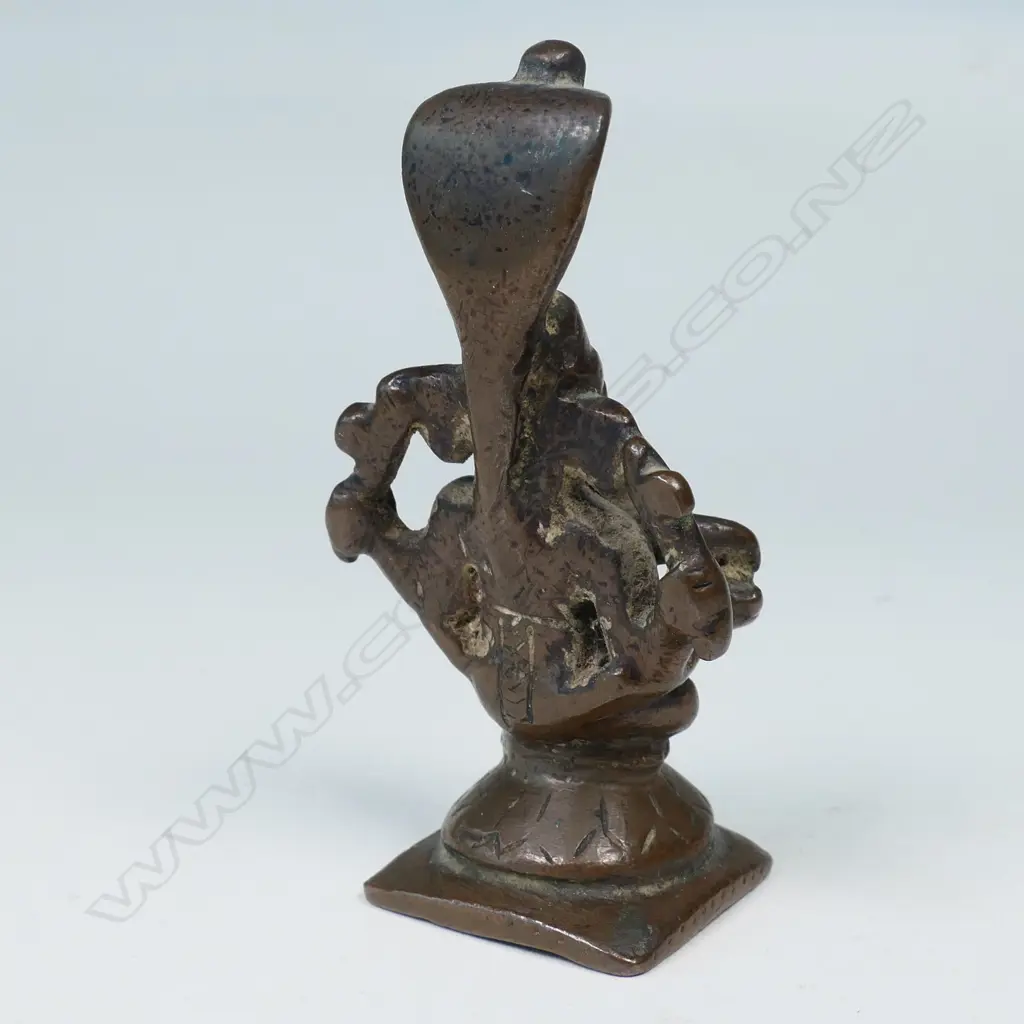 INDIAN BRONZE STATUETTE, GANESH SURMOUNTED BY A HOODED SERPENT CANOPY Image 1++