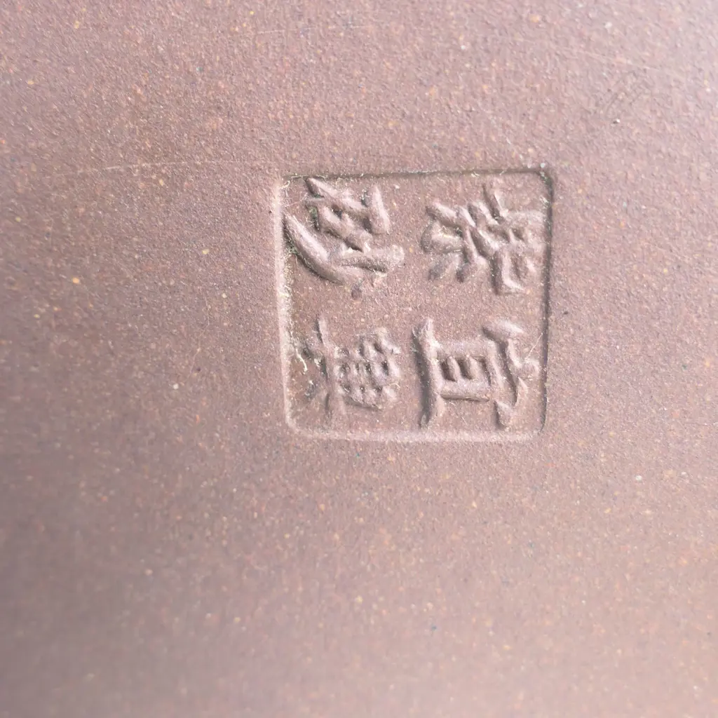 YIXING TEAPOT, MARKED 宜興紫砂 (YIXING ZISHA), MODELLED AS BUNDLED YARROW STALKS , I-CHING TRIGRAM PATTERN LID, CHIPS. W.190 Image 1++
