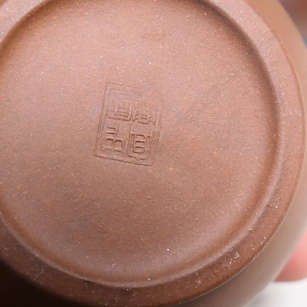 TWO SMALL YIXING TEAPOTS, MARKED 中國宜興. W.120 & 90mm Image 1++