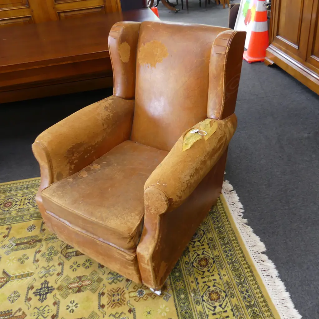 LEATHER WINGBACK CLUB CHAIR - DISTRESSED Image 1++