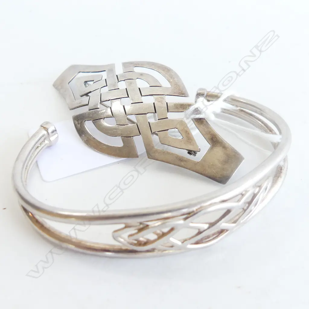 SILVER BROOCH AND SILVER CUFF WITH CELTIC DESIGNS Image 1++