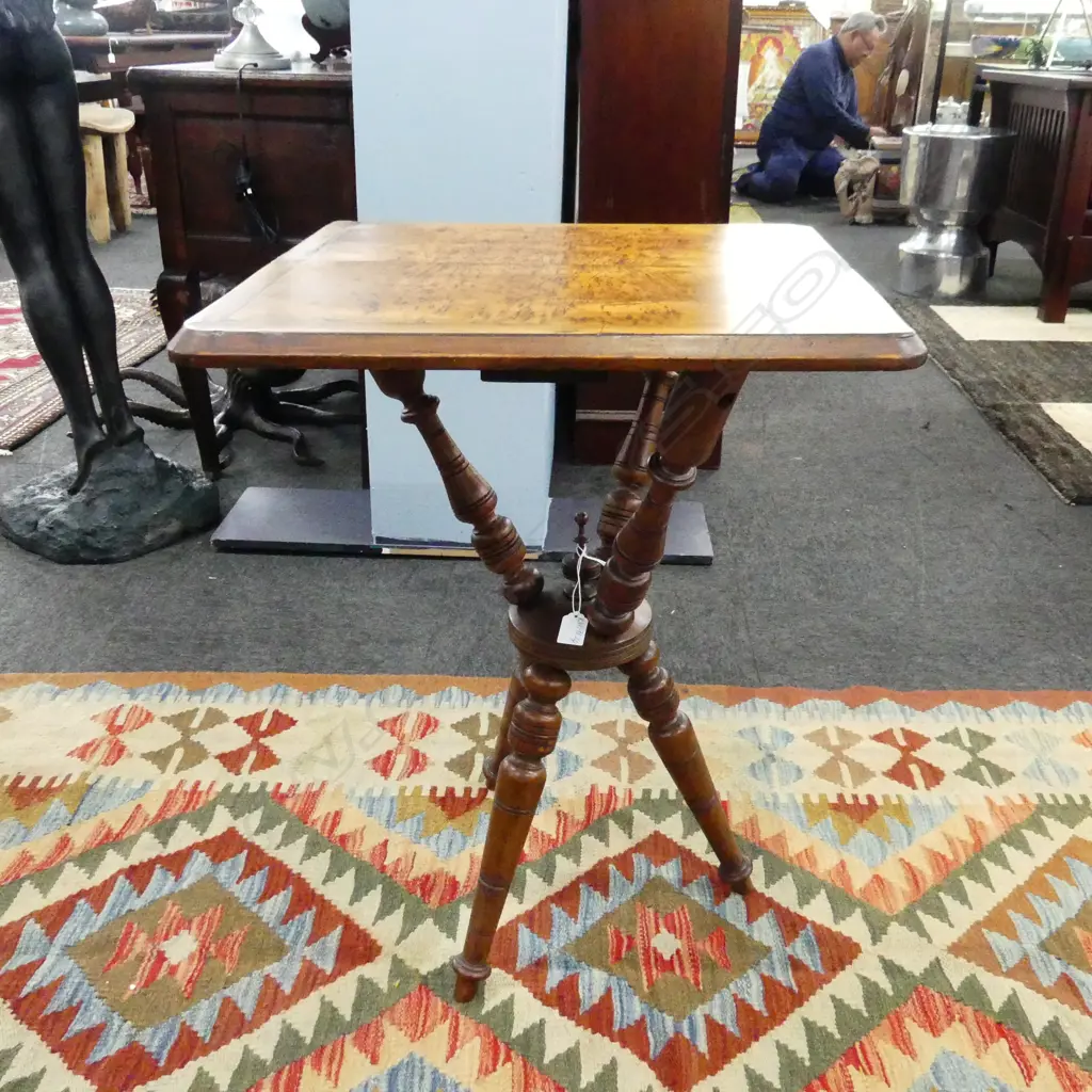 KAURI COLONIAL OCCASIONAL TABLE. SQUARE TOP IN BOOK VENEERED FLAME KAURI WITH REWAREWA BORDER. ON A GYPSY BASE. H. 700mm Image 1++