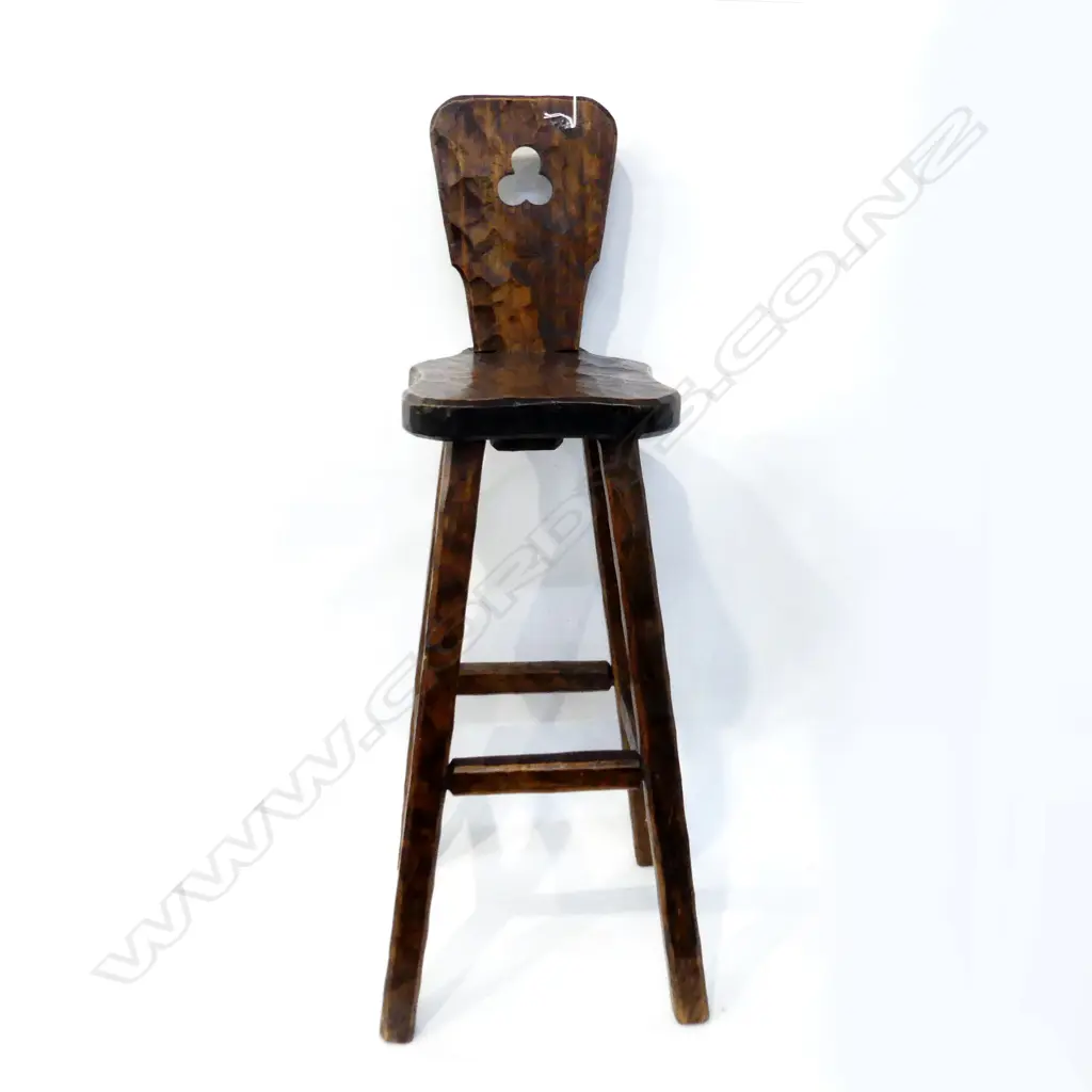TALL BAR STOOL WITH ADZED EFFECT. IN THE MANNER OF CHAPMAN TAYLOR WITH MAKERS CYPHER TO THE UPRIGHT BACK. H.1030mm Image 1++