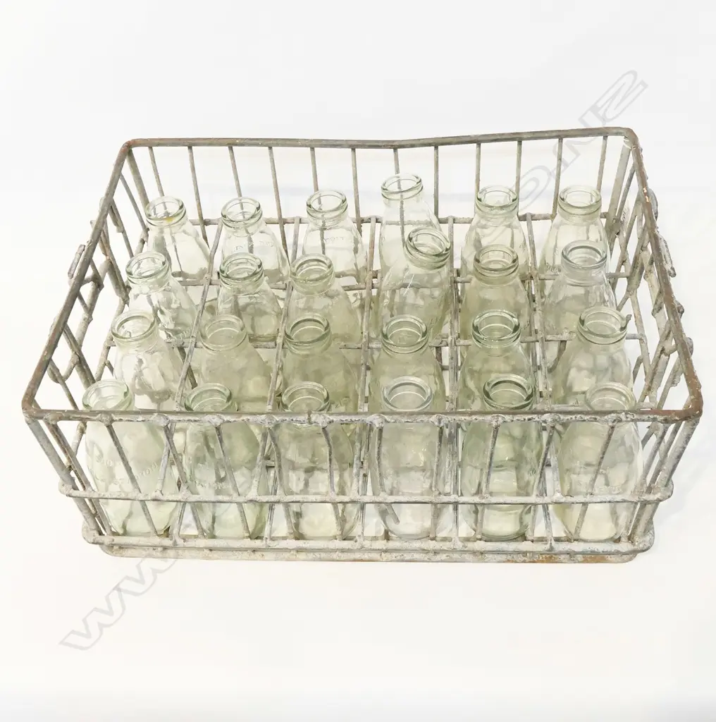 VINTAGE WIRE CRATE OF MILK BOTTLES 'NZD' H.150mm Image 1++