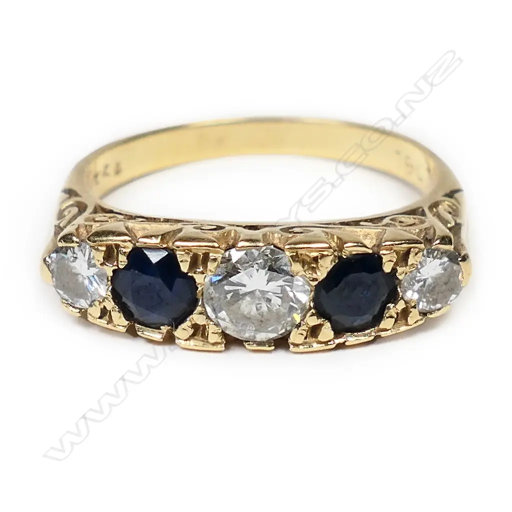 An 18ct gold estate diamond and sapphire ring, Image 1++