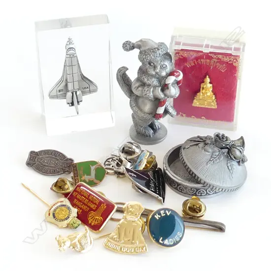 BAG MISC INCL ASST PINS & BADGES + PEWTER ORNAMENTS & ROCKET IN RESIN  ETC..