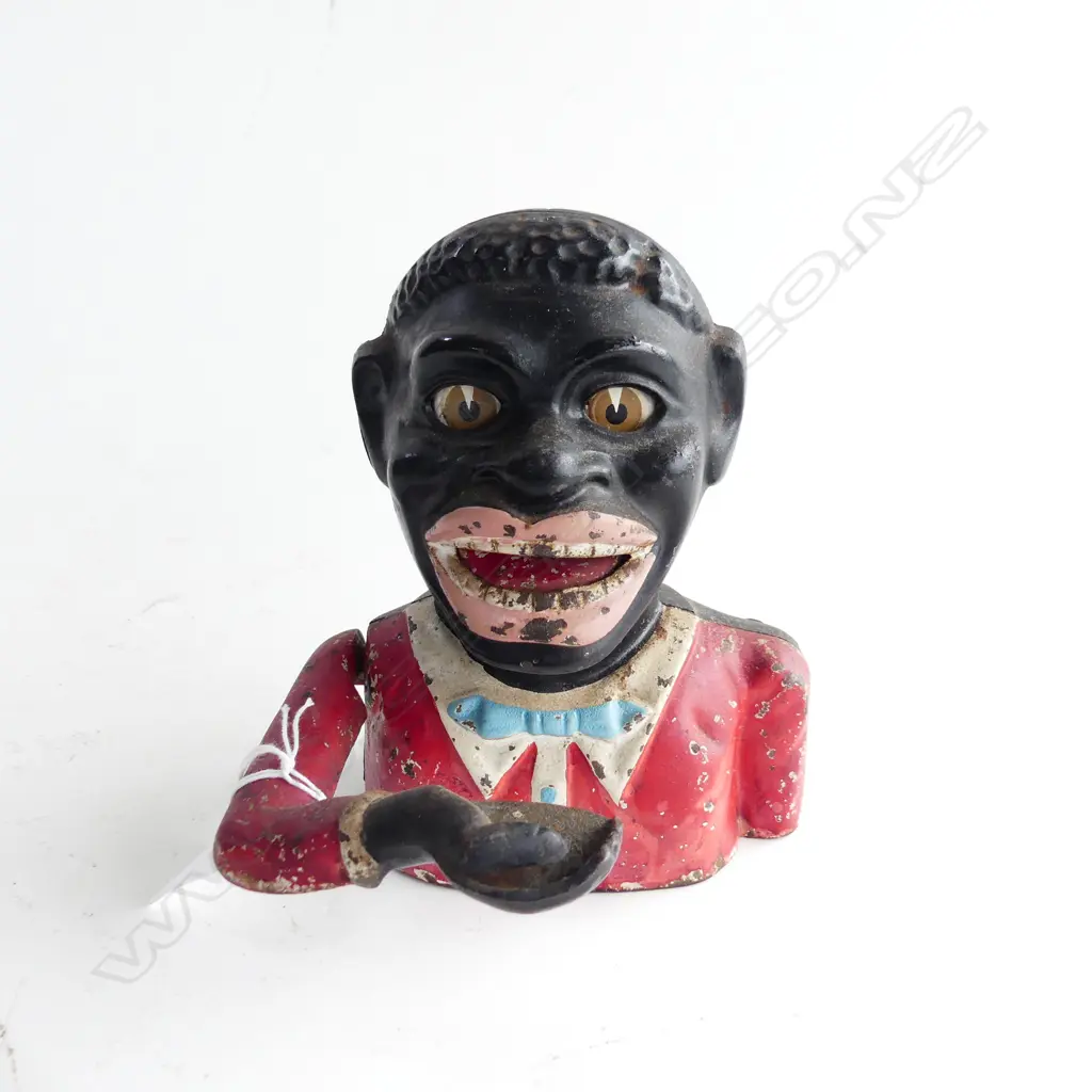 EARLY 20THC RED JACKET MONEY BOX by SYDENHAM & McOUSTRA in Walsall U.K. H.155mm Image 1++