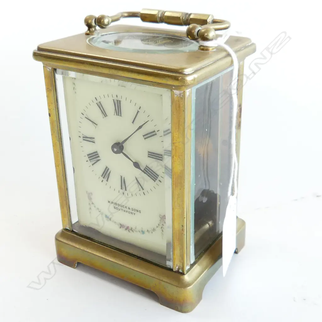 CARRIAGE CLOCK BY R&C PARIS - RETAILED H. PIDDUCK & SONS SOUTHPORT H.110mm w. key Image 1++