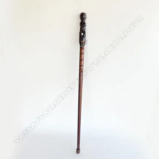 CARVED MAORI WALKING STICK WITH TIKI WITH PAUA SHELL EYES AT TOP