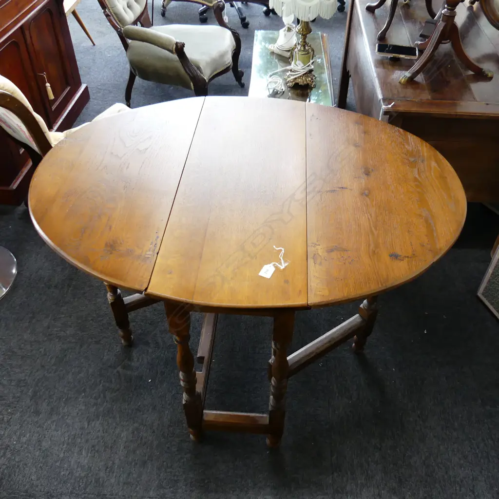 GEO.III OAK DROP LEAF TABLE. Turned supports has been repolished. c1800 Image 1++