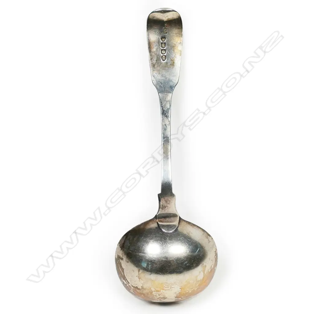 A William IV silver sauce ladle fiddle pattern with crested grip featuring three demi-unicorns. London 1835 by John Harris. L.180mm. 60gm. Image 1++