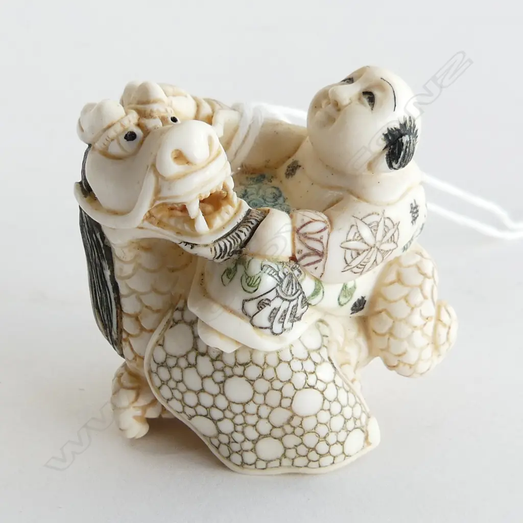 IVORY NETSUKE; MAIN RIDING DRAGON, SIGNED W.40mm Image 1++