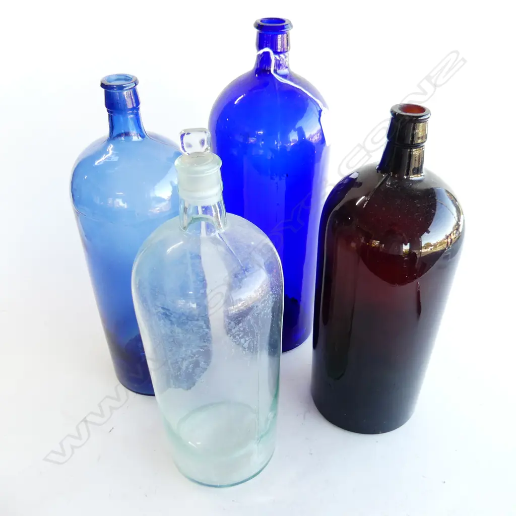 4 LARGE VINTAGE GLASS BOTTLES; 2 BLUE (H.400 & 370MM) 1 AMBER (H360MM) & 1 LIGHT GREEN /BLUE WITH STOPPER (H370MM) Image 1++