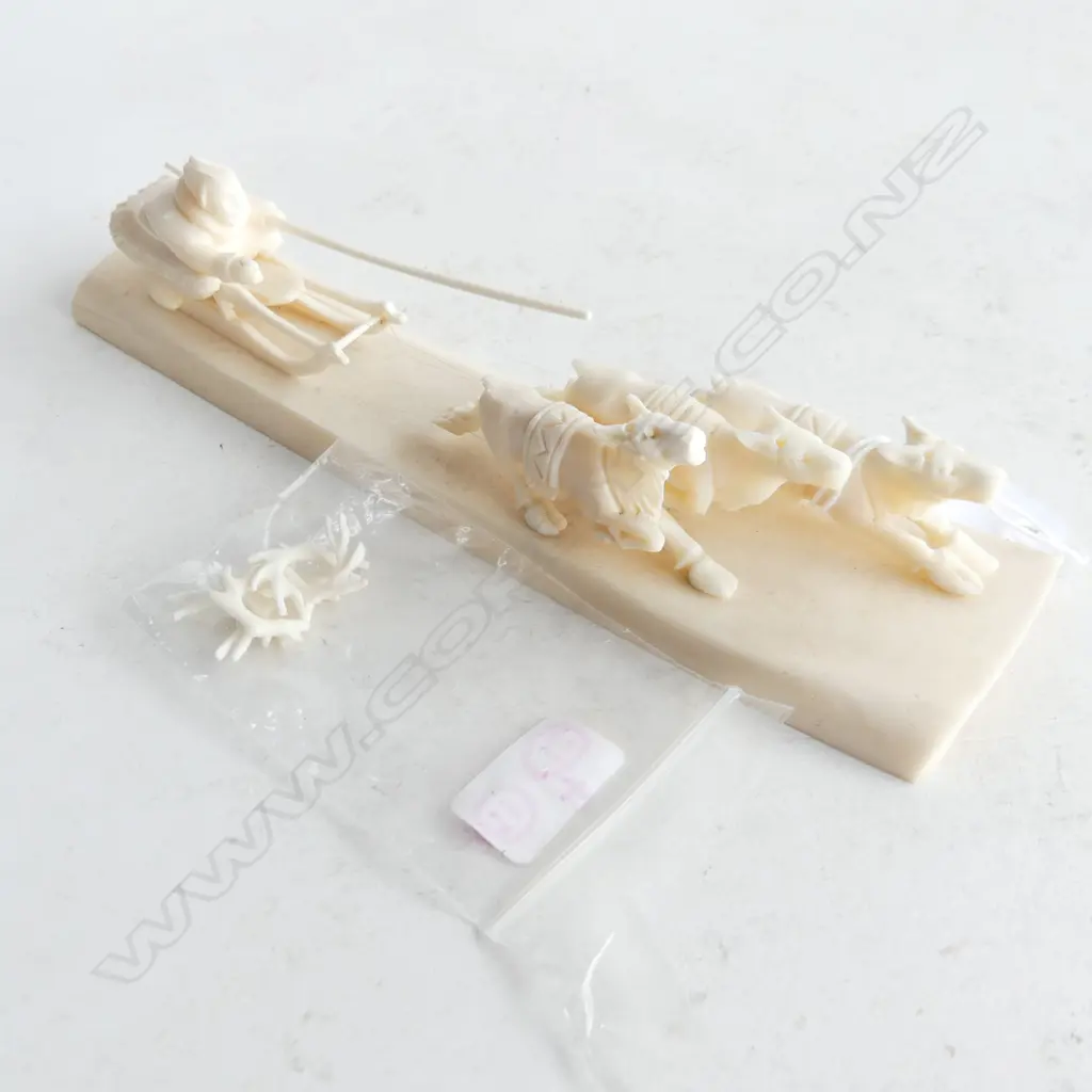 SIGNED CARVED BONE w. INUIT MAN ON SLED PULLED BY 3 REINDEER L.195mm Image 1++