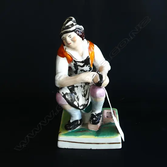 STAFFORDSHIRE FIGURINE OF SHOE MAKER H. 180MM